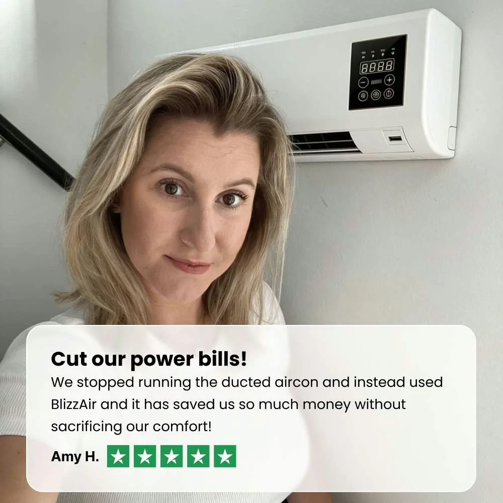 Customer relaxing beside a running BlizzAir portable air conditioner
