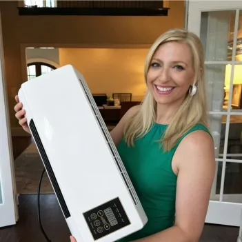 Sarah with her BlizzAir portable air conditioner at home in Manchester